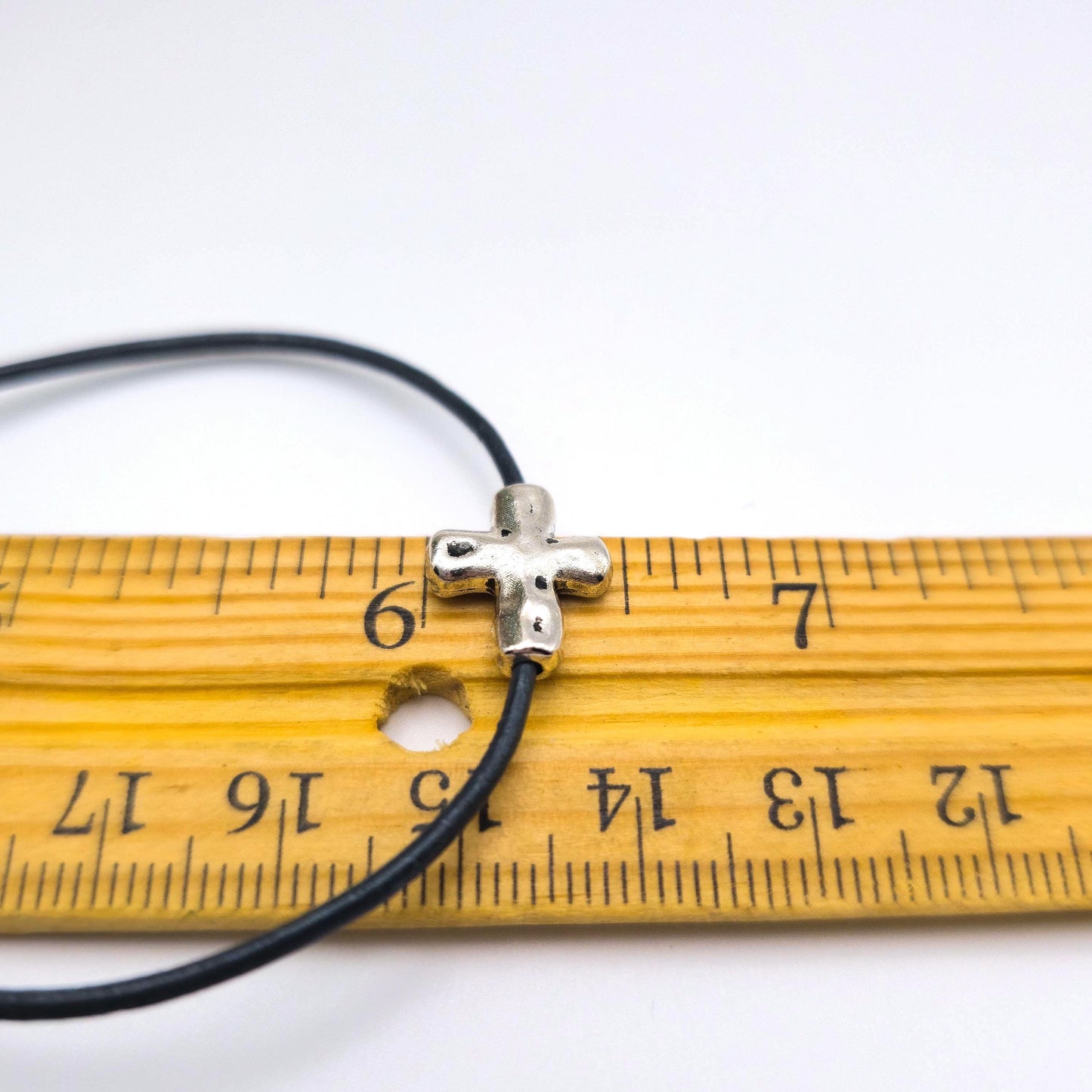 Minimalist Silver Cross Leather Bracelet for Christian Faith.