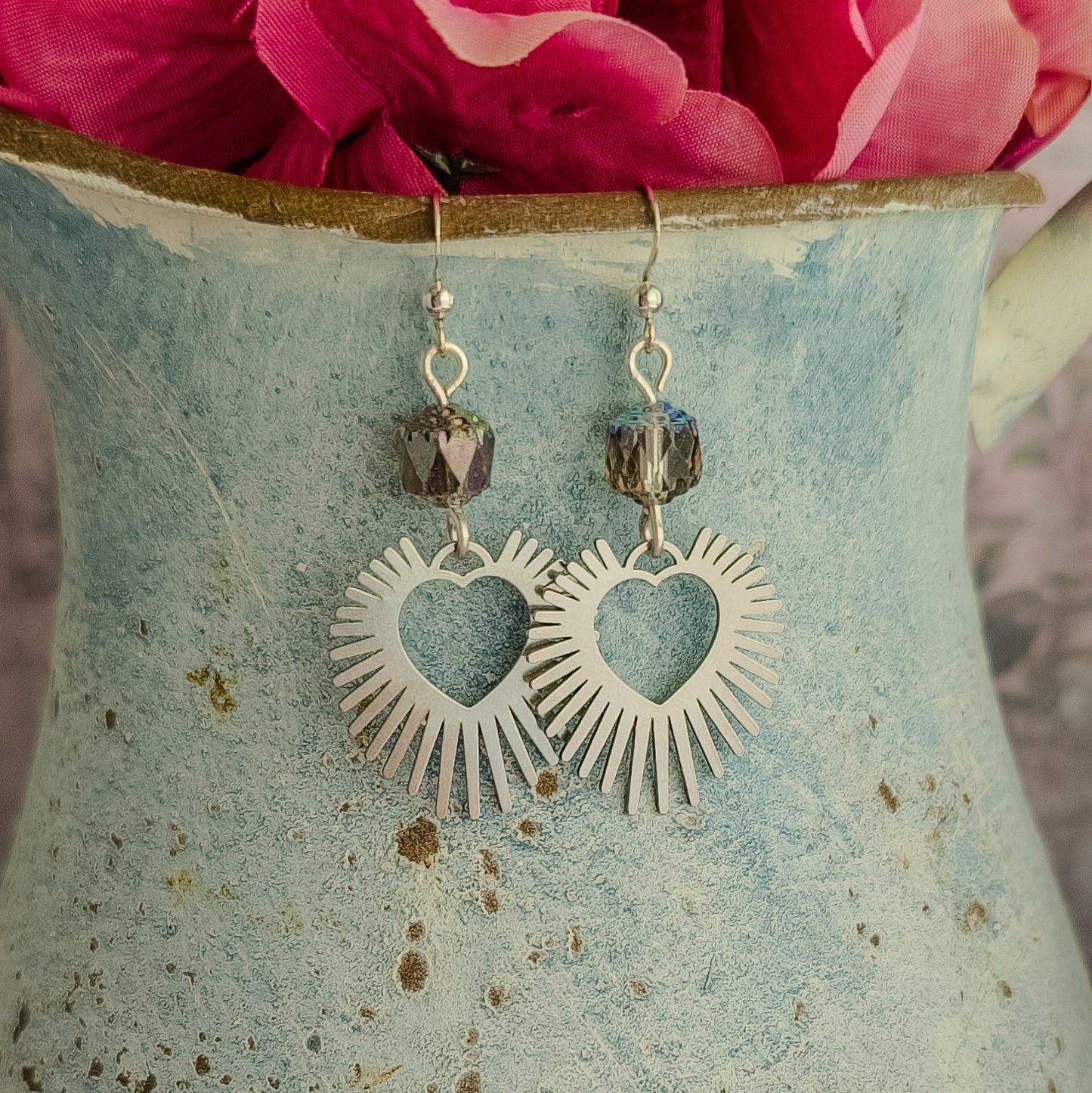 Statement Earrings: Bold Silver & Crystal Hearts.