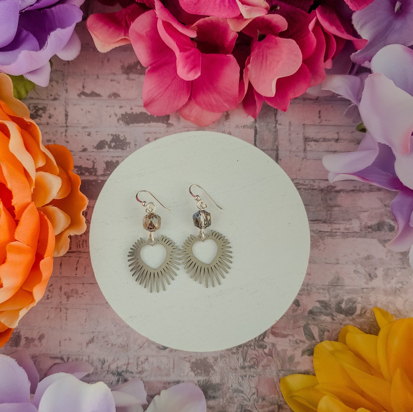 Statement Earrings: Bold Silver & Crystal Hearts.